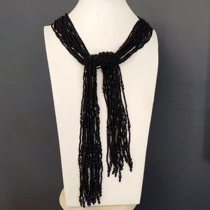 Long multi loose strand jet black beaded necklace